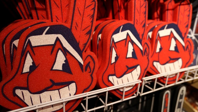 Foam Chief Wahoos line the shelf at the Cleveland Indians team shop, Monday, Jan. 29, 2018, in Cleveland. Divisive and hotly debated, the Chief Wahoo logo is being removed from the Cleveland Indians' uniform next year. The polarizing mascot is coming off the team's jersey sleeves and caps starting in the 2019 season. The Club will still sell merchandise featuring the mascot in Northeast Ohio. (AP Photo/Tony Dejak)