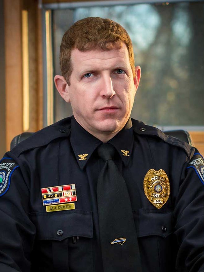 Woodfin police chief wants apology from Buncombe County commissioners