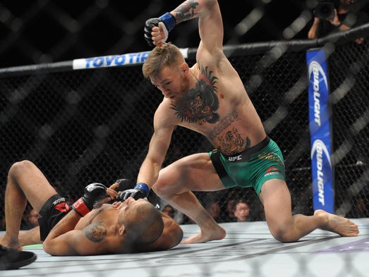 McGregor lands punches to win a technical knockout