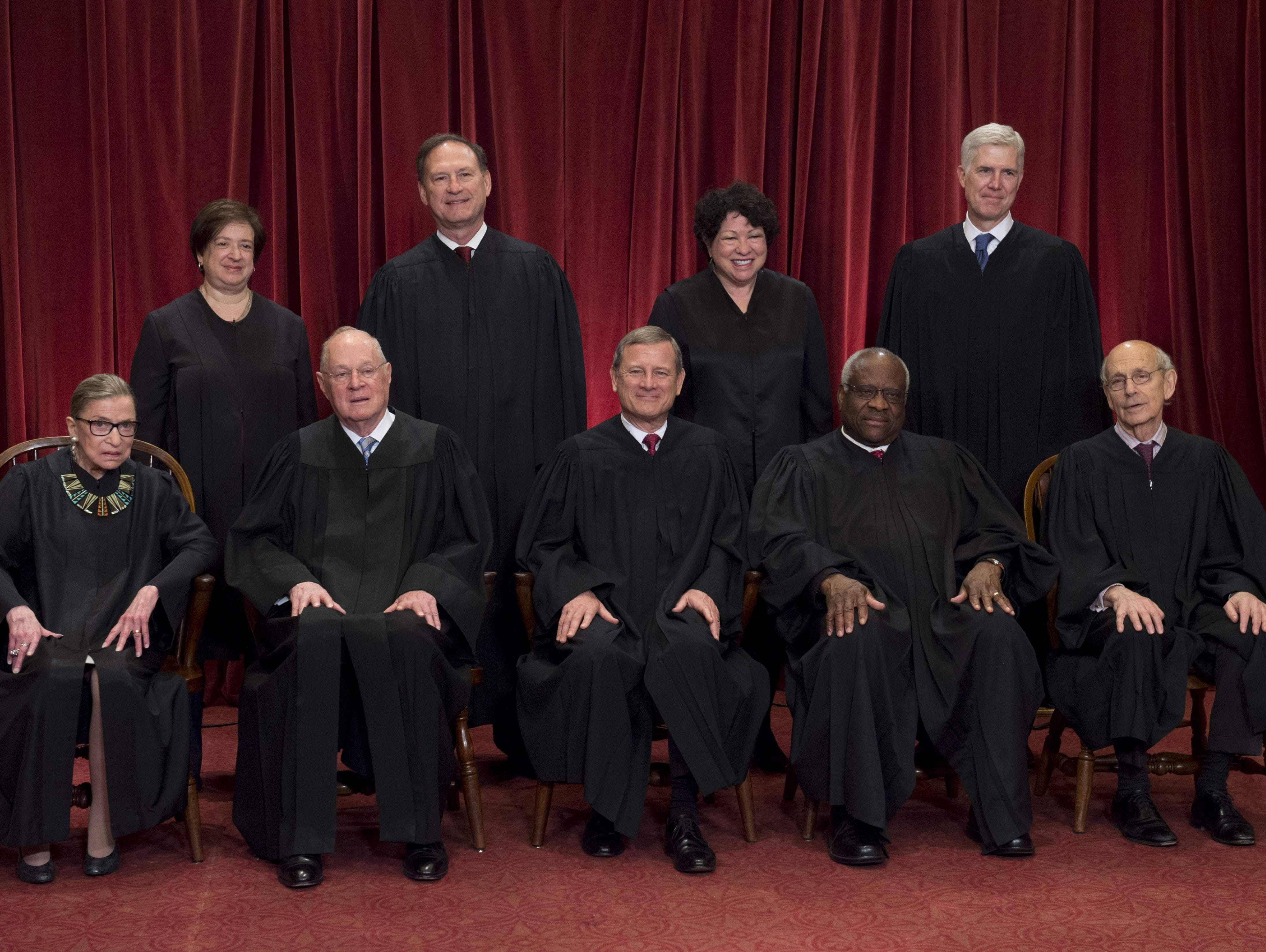 Justices of the Supreme Court sit for their official