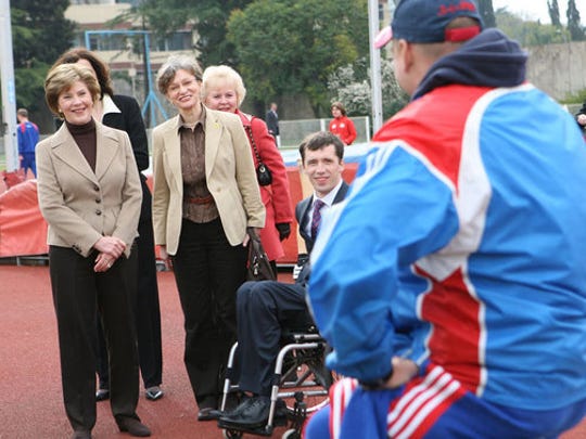 First Lady Laura Bush visits with members of the Russian