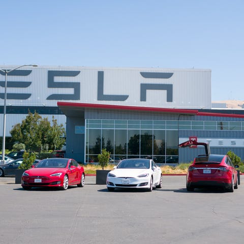 Tesla vehicles outside of the company's factory in