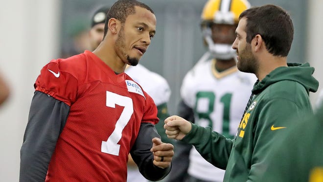 Green Bay Packers quarterback Brett Hundley (7) fist bumps during practice inside the Don Hutson Center Wednesday, November 15, 2017 in Ashwaubenon, Wis.