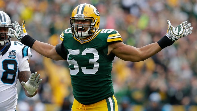 Packers linebacker Nick Perry celebrates a sack in the first quarter of a 2014 game against the Panthers at Lambeau Field.