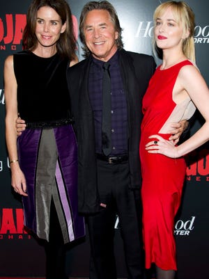 Don Johnson and his wife Kelley Phleger, left, and daughter Dakota Johnson, righ at a premiere in 2012. 