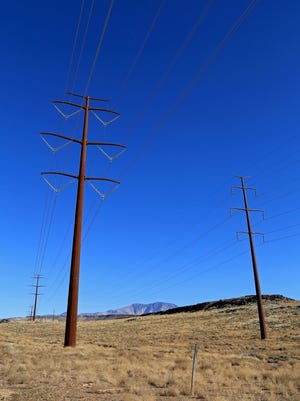 Power lines mar the best views of Pine Valley Mountain along the Black Knolls Trail in the Red Cliffs Desert Reserve north of St. George.