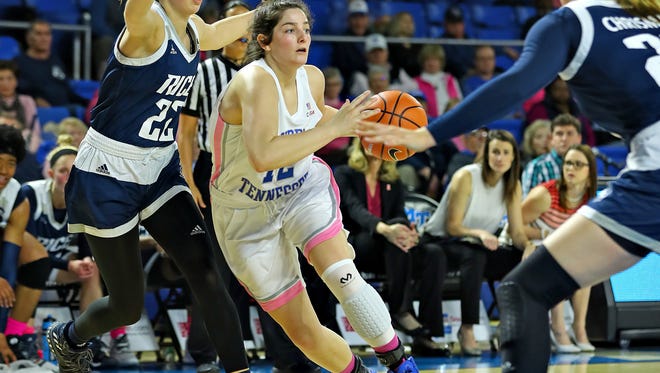 MTSU guard Jess Louro makes a move to the basket in a game against Rice at Murphy Center on Feb. 17, 2018.