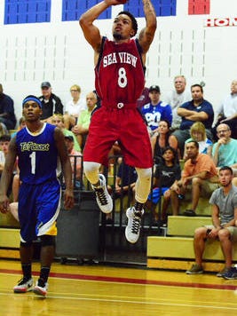The Jersey Mike's Jersey Shore Basketball League Championship game between Seaview Jeep and T&T Coast was held at Wall Twp. High School in Wall on Monday evening. Seaviewâs Justin Robinson (8) is shown during first half action.