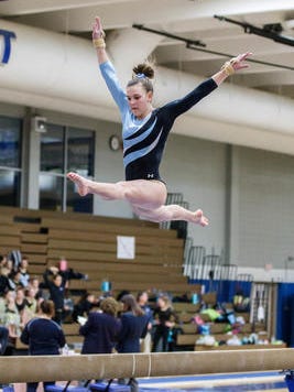 Arrowhead junior Lexi Woida, shown in a meet from last season, won the Division 1 all-around title at the WIAA state meet Saturday in Wisconsin Rapids.