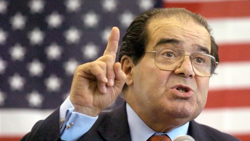 In this 2004 file photo, U.S. Supreme Court Justice Antonin Scalia speaks to Presbyterian Christian High School students in Hattiesburg, Miss. On Feb. 13, 2016, Scalia died at the age of 79.
