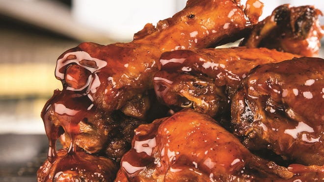 Wings topped with 100 proof Kentucky Bourbon Glaze.