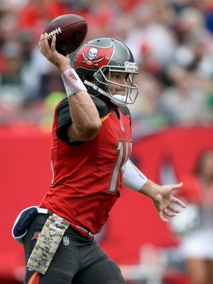 Tampa Bay Buccaneers quarterback Ryan Fitzpatrick (14) throws a pass against the New York Jets during the first half of an NFL football game Sunday, Nov. 12, 2017, in Tampa, Fla. Fitzpatrick is playing in place of injured Jameis Winston. (AP Photo/Jason Behnken)