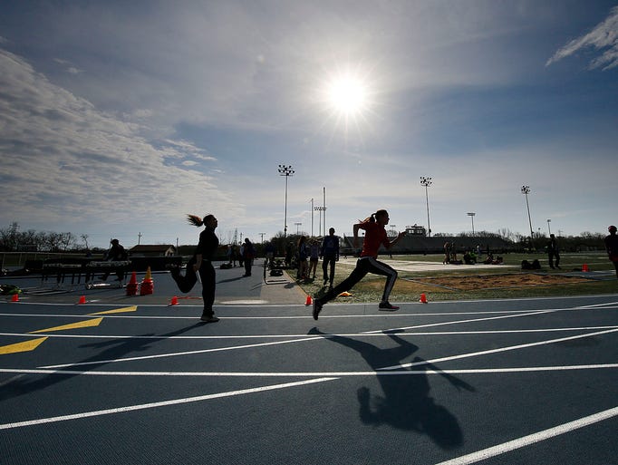 Competitors warm-up under the spring sun before the