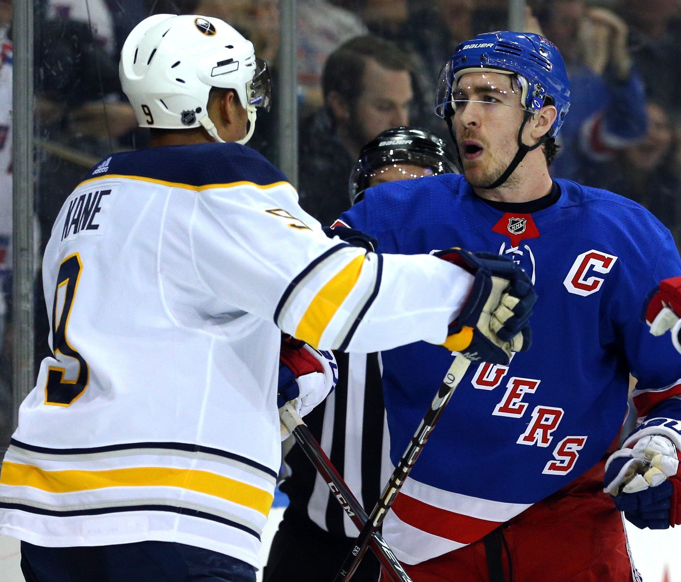 Buffalo Sabres winger Evander Kane (left) and New York Rangers defenseman (right) could be wearing new uniforms by the end of the day.