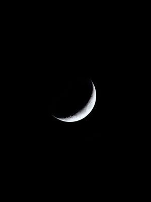 A slight crescent moon will begin to appear early evening toward Feb. 10.