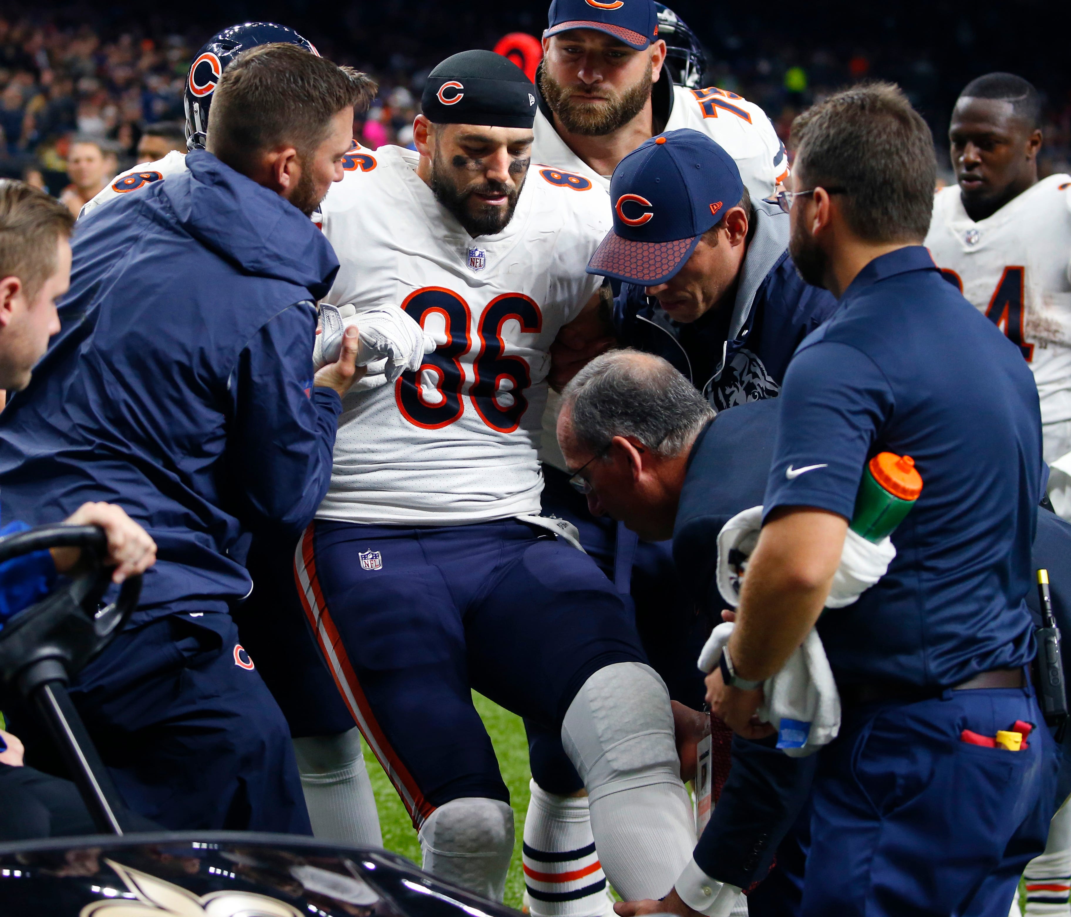 Chicago Bears tight end Zach Miller (86) is placed on a cart after injuring his leg in the second half of an NFL football game against the New Orleans Saints in New Orleans, Sunday, Oct. 29, 2017. Miller hurt his leg on an apparent touchdown receptio