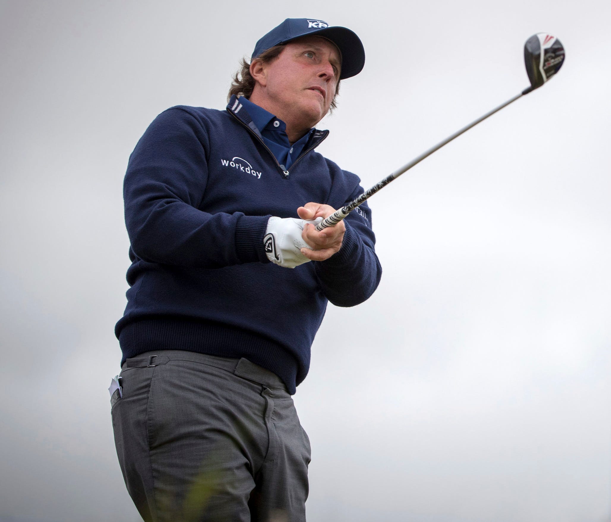 Phil Mickelson tees off at the 2nd, during day one of the Scottish Open golf tournament at Gullane Golf Club, East Lothian, Scotland, Thursday July 12, 2018.  Mickelson said Thursday, he wishes he could take back the moment when he swatted a moving g