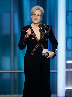 This image released by NBC shows Meryl Streep accepting the Cecil B. DeMille Award at the 74th Annual Golden Globe Awards at the Beverly Hilton Hotel in Beverly Hills, Calif., on Sunday. In her remarks, Streep called on "the famously well-healed Hollywood Foreign Press (Association) and all of us in our community to join me in supporting the Committee to Protect Journalists because we are going to need them going forward, and they'll need us to safeguard the truth." (Paul Drinkwater/NBC via AP)