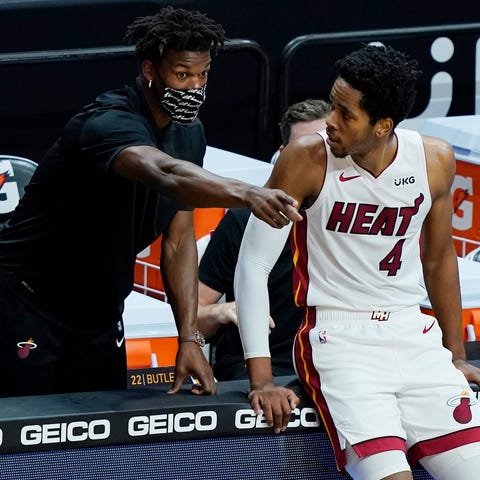Miami Heat forward KZ Okpala (4) listens to teamma