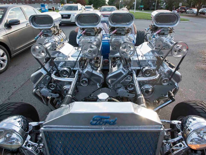Car enthusiasts cruise Woodward Thursday.