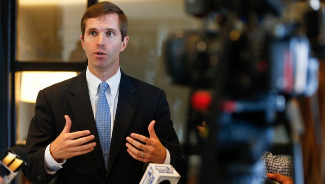 Kentucky Attorney General Andy Beshear speaks with media at the Galt House about the recent U of L foundation audit. June 12, 2017