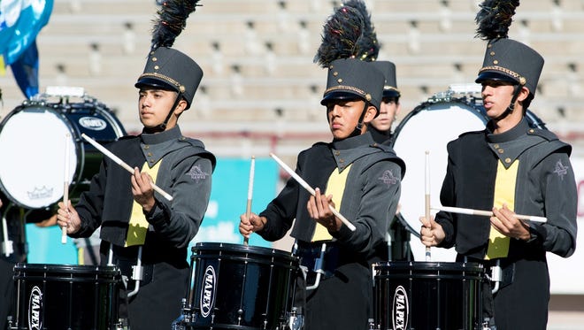 The Centennial High School band performs Saturday during the 38th annual New Mexico State University Tournament of Bands at Aggie Memorial Stadium.