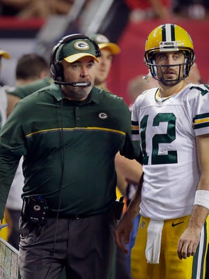 Packers coach Mike McCarthy and quarterback Aaron Rodgers have had their ups and downs this season.