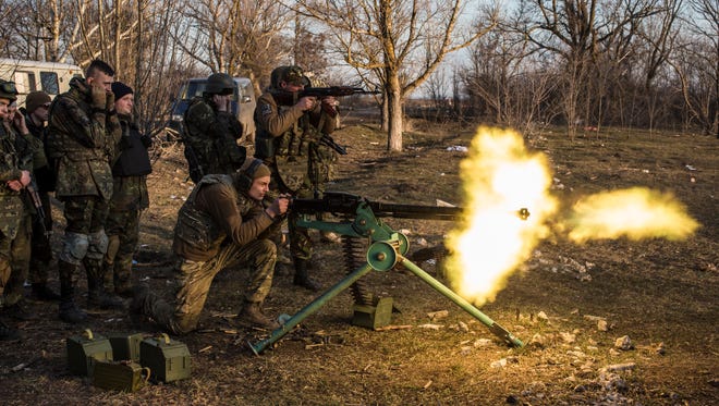 Members of the Azov Brigade train in Kulykivske, Ukraine, on March 7.