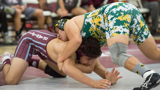 Coachella Valley matches up against Rancho Mirage in the De Anza League wrestling finals, Wed. January 25, 2017.