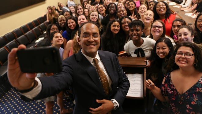 Rep. Will Hurd takes a selfie before speaking to the group Running Start, a program for girls in high school and college who are interested in politics.