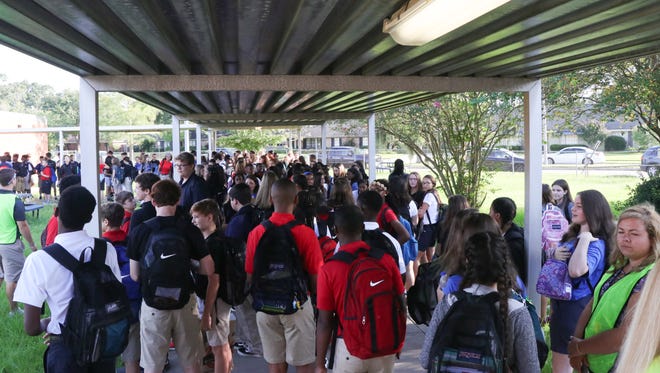 Students arrive back to school in August 2017.