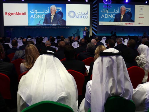 Audience members attend a speech by Tillerson during