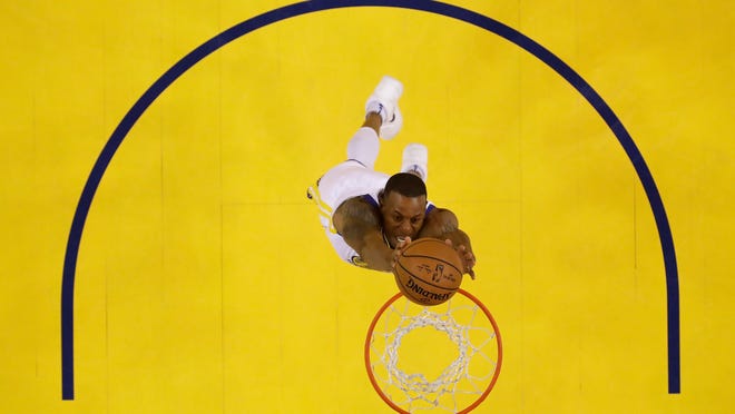 Golden State Warriors' Andre Iguodala goes up for a dunk against the Houston Rockets during the first half in Game 3 of the NBA basketball Western Conference Finals Sunday, May 20, 2018, in Oakland, Calif. (AP Photo/Marcio Jose Sanchez)