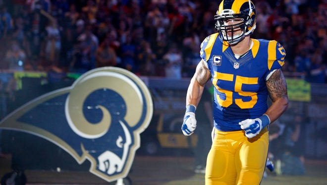 St. Louis Rams middle linebacker James Laurinaitis is introduced before an NFL football game against the San Francisco 49ers Monday, Oct. 13, 2014, in St Louis. (AP Photo/Scott Kane)