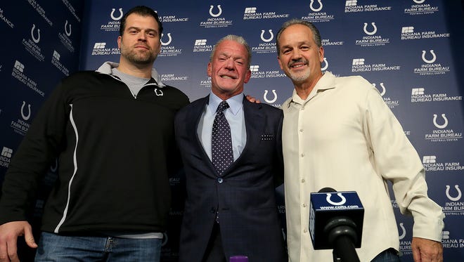 The Indianapolis Colts announce that head coach Chuck Pagano will return as he signs a contract extension with the team. Here Indianapolis Colts owner Jim Irsay,middle, his head coach Chuck Pagano,right, and Colts GM Ryan Grigson,left, pose for a group photo following their press conference.
