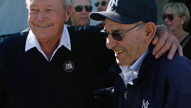 Arnold Palmer (left), seen here with baseball star Yogi Berra, has his name throughout the history books of the CareerBuilder Challenge.