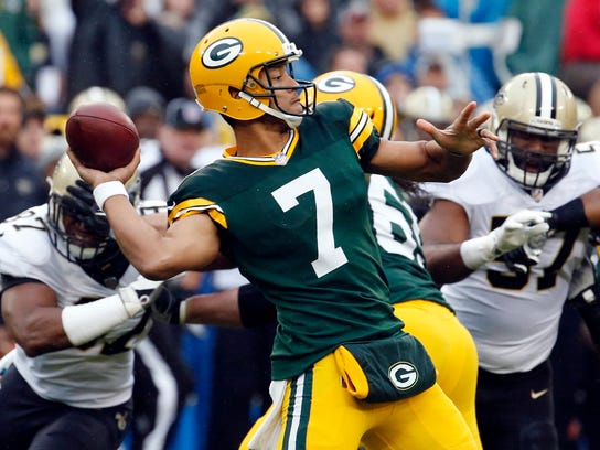 FILE - In this Sunday, Oct. 22, 2017, file photo, Green Bay Packers quarterback Brett Hundley (7) throws a pass during the first half of an NFL football game against the New Orleans Saints in Green Bay, Wis. NFC North rivals looking for fixes on offense face off on Monday night when the Detroit Lions visit the Green Bay Packers.  (AP Photo/Mike Roemer, File)