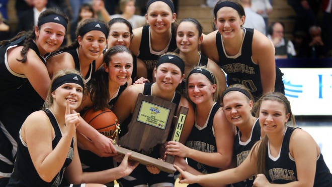 Noblesville players celebrate their Class 4A girls sectional championship over Fishers at Hamilton Southeastern High School in Fishers on Saturday, Feb. 14, 2015. The 55-41 win over Fishers, last year's sectional champion, is the first for the Lady Millers since 1996.
