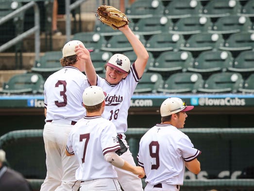 Newman Catholic celebrate their win over St. Mary's,