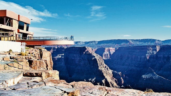 The Skywalk allows guests to traverse 70 feet out over the Grand Canyon's rim and peer through its glass walkway at the canyon floor 4,000 feet below.