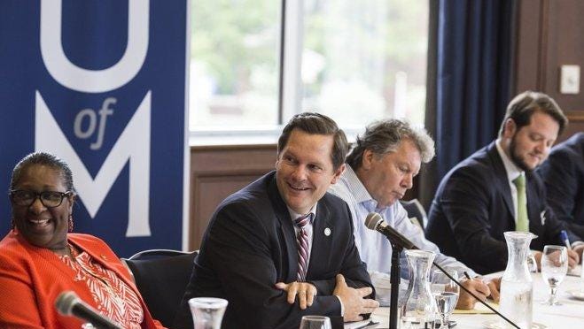Rep. Cameron Sexton, second from left, smiles while introducing guests at a public meeting about House Speaker Beth Harwell’s health care task force at the University of Memphis. The task force could pave the way for scaled-down expansion of health care coverage in Tennessee.