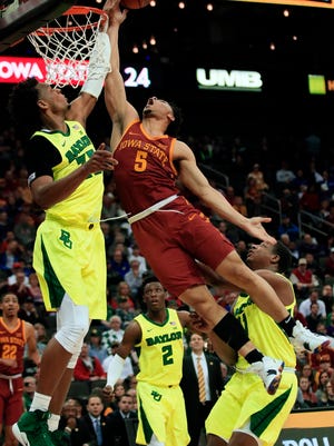 Baylor forward Freddie Gillespie (33) blocks a shot by Iowa State guard Lindell Wigginton (5) during the first half of an NCAA college basketball game in the quarterfinals of the Big 12 conference tournament in Kansas City, Mo., Thursday, March 14, 2019. (AP Photo/Orlin Wagner)