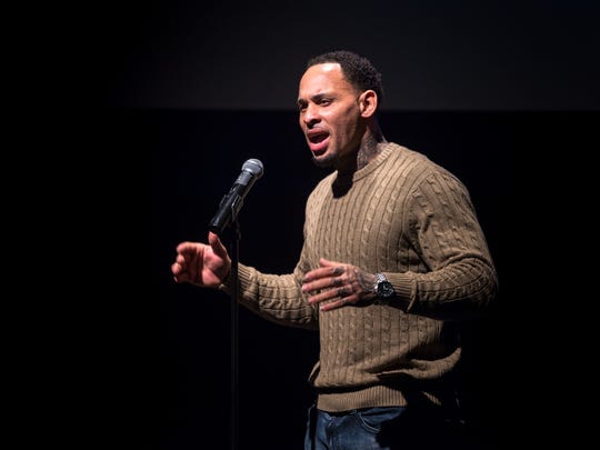 Marcus Simmons on stage as The Daily Advertiser host The Lafayette Storytellers Project, a night of stories about fresh starts, whether by choice or by chance – taking that first step, stumbling through the second and not knowing how it will all work out. Tuesday, Jan. 23, 2018.