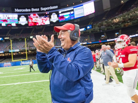 Notre Dame coach Lewis Cook, shown here celebrating his Pioneers' Division III state championship last month in New Orleans, has been honored as the New Orleans Saints' Coach of the Year, earning him a trip to the Pro Bowl and possibly even the Super Bowl.