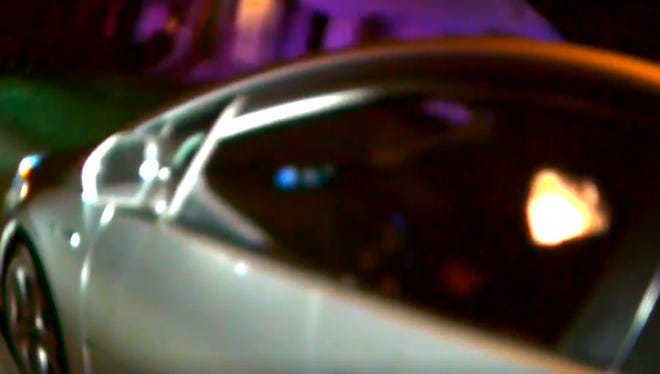 A screenshot of body-cam footage of a former City Council member's traffic stop.