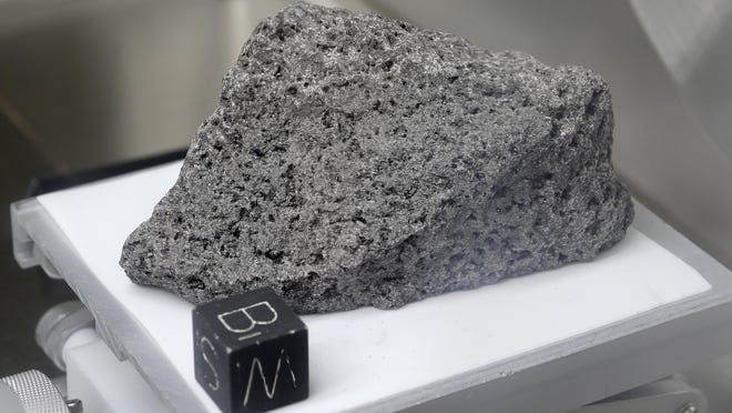 Collected during Apollo 17, a 3.5 billion-year-old basalt rock known as “The Children of the World” or “The Goodwill Sample” is displayed in the lunar lab at the NASA Johnson Space Center in Houston. It was used to make samples that were gifted to every country on Earth.