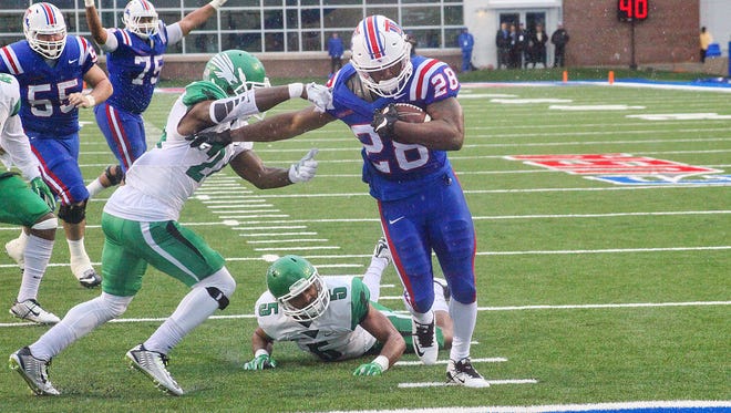 Louisiana Tech running back Kenneth Dixon scored six touchdowns in Saturday's win over North Texas.
