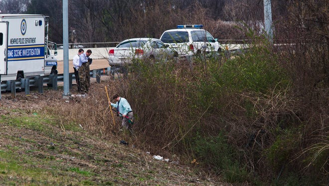January 25, 2017 - MPD investigators comb the area near an exit ramp at Airways and I-240 after possible human remains were discovered on Wednesday.