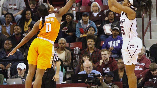 Mississippi State forward Victoria Vivians (35) shoots a 3-pointer over Tennessee guard Jordan Reynolds (0) during the first half of their game  Thursday.