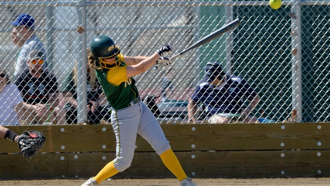 CMR's Kayci Edwards makes contact in Thursday's softball game against Helena Capital.